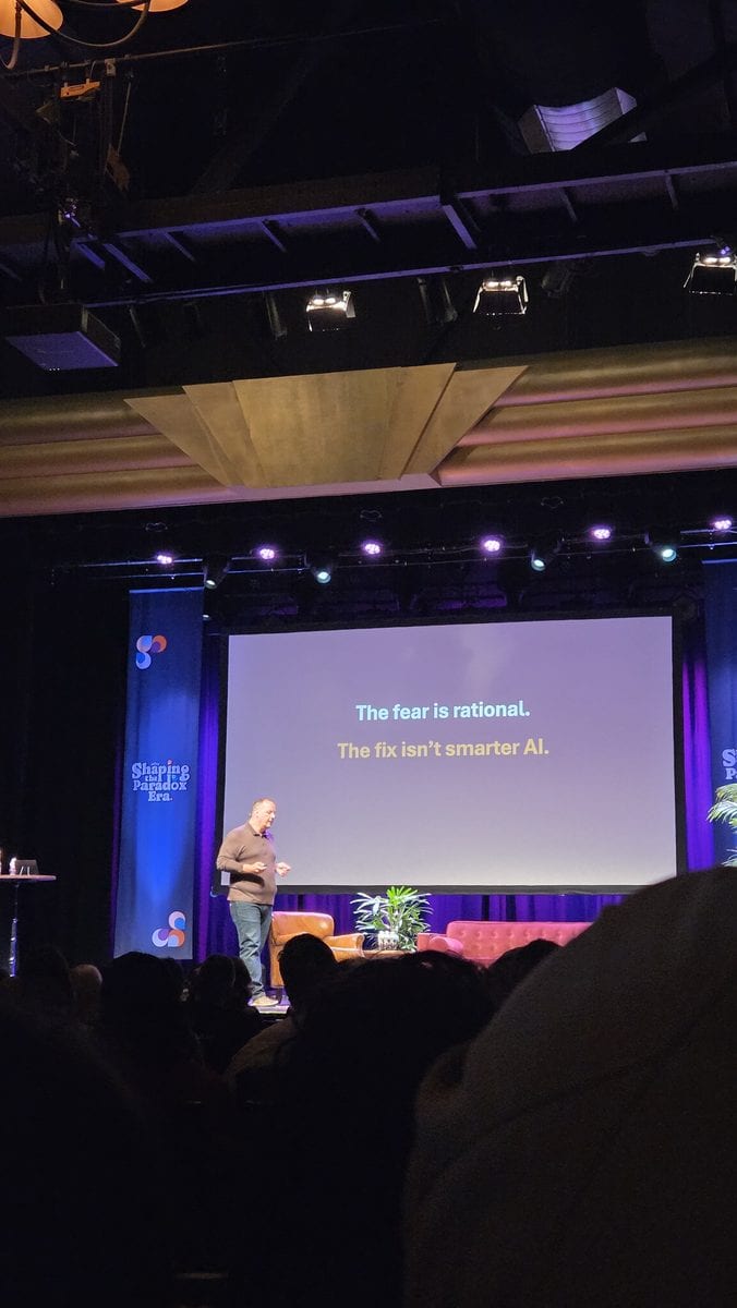 Heiko Hotz from Google on stage at Something Digital beside a slide reading The fear is rational. The fix isn't smarter AI.